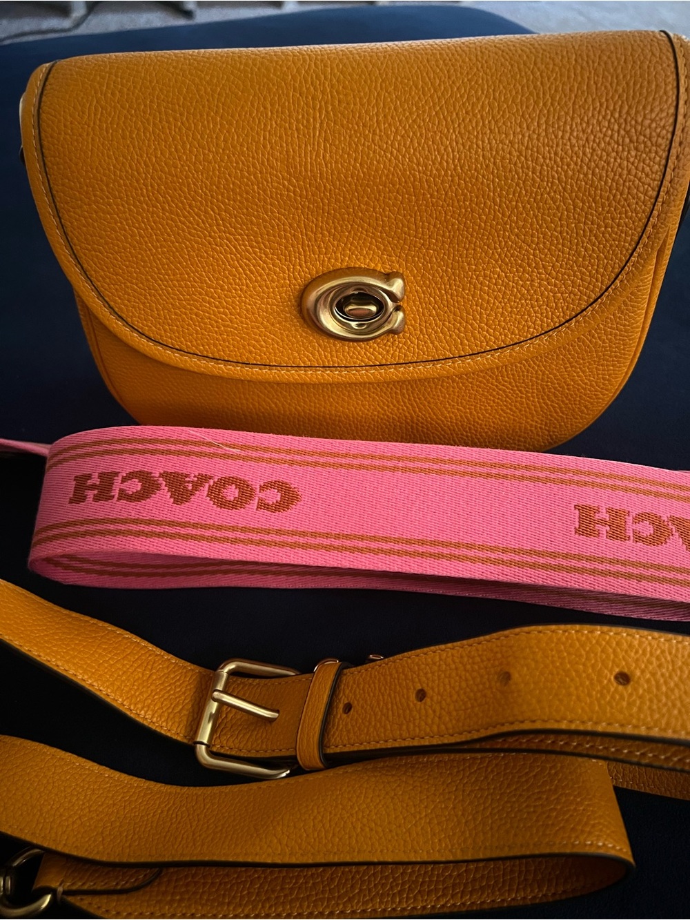 Coach Mustard Pebbled Leather Crossbody with Pink Logo Strap